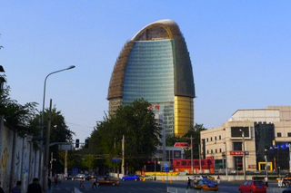 Illustration for article titled Chinese Newspaper's HQ Now Looks Like a Golden Penis